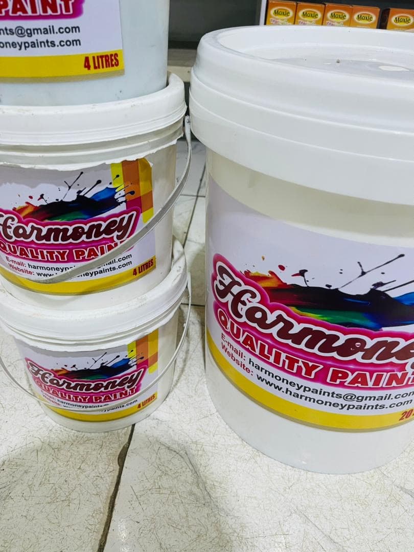 Harmoney Paints buckets arranged in the showroom.